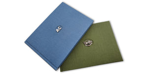 Guestbooks with initials or hunting motif