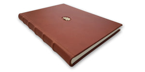 handbound leather book with prince croy family crest